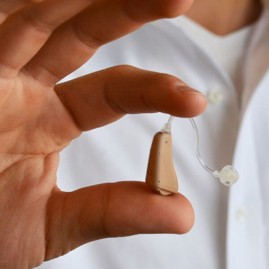 The Hidden Value of Inexpensive Hearing Aids