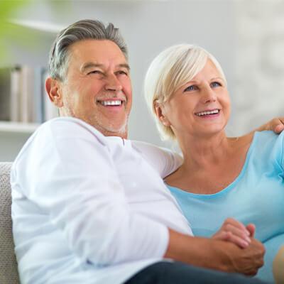 Elderly Couple Watching Television